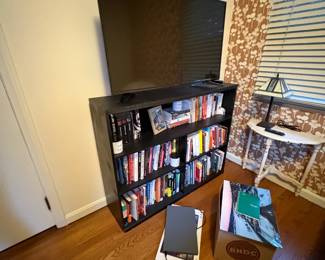 . . . bookcase and another flat-screen TV
