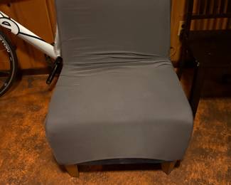 . . .  grey-covered chair