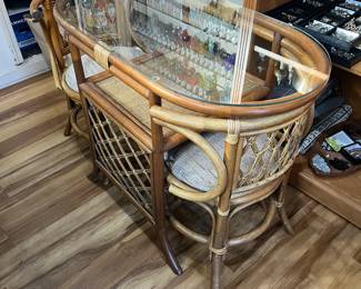 Vintage Rattan table with nesting chairs