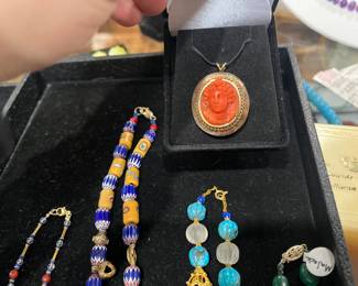 Etruscan Revival Cameo- Natural coral in excellent condition, set in gold.