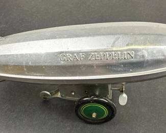 VINTAGE SCHILLING TIN TOY