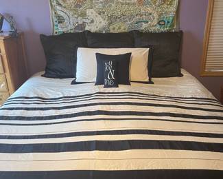 California King Size Comforter, pillows galore (more than shown), matching rug.  Perfect condition.  $50