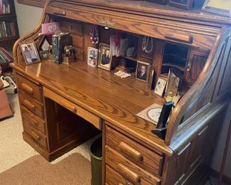 Post Master Brand Rolltop Wooden Desk with countless storage spaces.  Perfect condition.  Approx 60 x 33 and 50" high.  $500