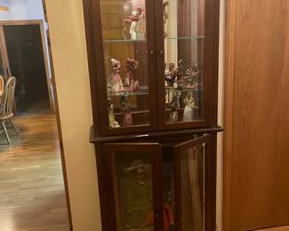 Curio display cabinet, both lower level and upper level are lighted, with glass shelves.  31 x 12, 76" high.  $60