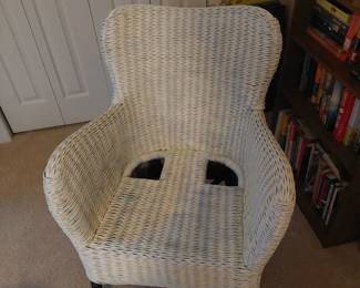 wicker chair, part of a wicker bedroom set
