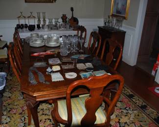 Dining room table and 8 chairs, have an extra leaf