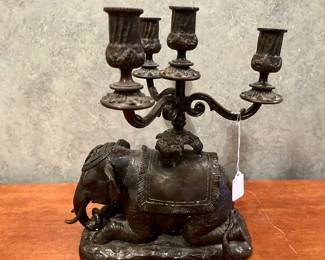 This cool elephant candelabra  wants to go home with you! 