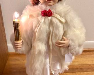 Lots of Christmas decor & collectibles including this sweet vintage moving girl