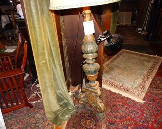 This is the Base of a Truely Antique torchiere tha has bee Elcirfied and urned into a Very Interesting Floor lamp