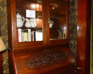 At Nearly 8 ft Tall this Victorian Mahogany SlantFront Secretary/ Bookcasehas FItted Interior and Has Been Lighted. Nice Carving on Lid