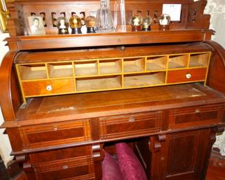 An Antique Mahogany "D" Roll Desk w/ FIttted Inerior