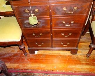 A Little mahogany Antique Bacheor's Chest has Faux Drawer (Really Doors) andOpens Front or Top