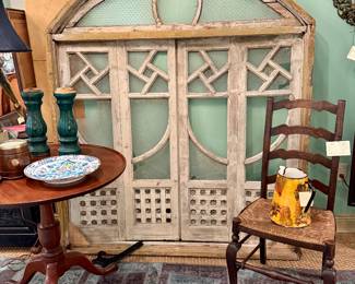 Large distressed arched glass and wood window 