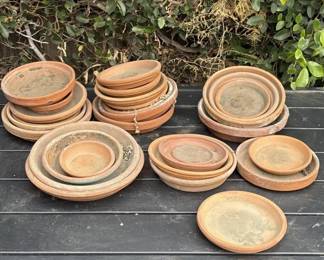 Lot # : 322z - Large group of 27 terracotta plant saucers
