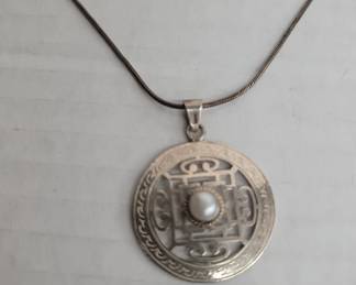 Lot # : 463 - Pair of sterling chains with pendants
