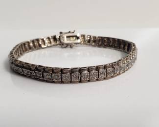 Lot # : 41 - Tennis bracelet marked 925 w/ diamonds
