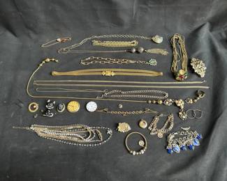 Lot # : 387 - Group of costume jewelry parts in pb
