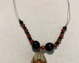 Lot # : 310f - Vintage necklace with bug encased in resin
