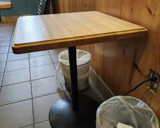 24in Wood Table W/Metal Base And 2 Small Trash Cans
