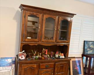 China cabinet, air filters, figurines, artwork