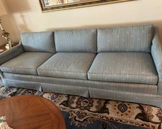 Mid-Century Couch w/ wooden legs ( covered)