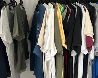 Harley Davidson T-shirts from different states, some band t-shirts, Gators T-shirts.