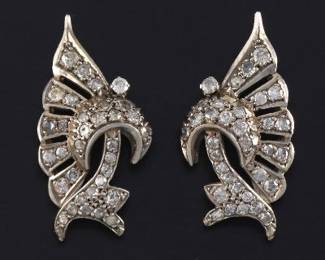 A Pair of Diamond and Sterling Silver Exotic Style Earrings 