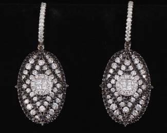 A Pair of Black and White Diamond Earrings 