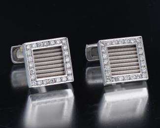 A Pair of Gold and Diamond Cufflinks 