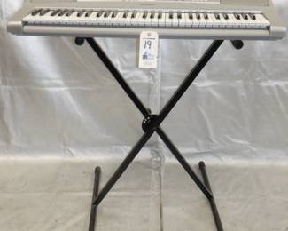 YAMAHA ELECTRIC PIANO WITH STAND