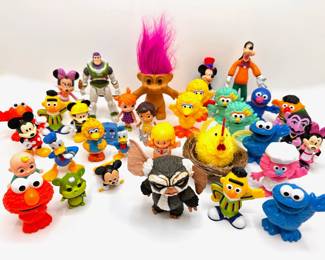 Over 30 Small Toy Figurines Including Disney, Sesame Street, Troll, Gremlin & More
Lot #: 206