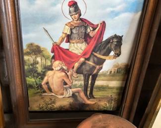 Framed Religious Artwork
A stunning framed print depicting a saintly figure sharing his red cloak, set against a pastoral background. Ideal for those who appreciate religious or inspirational art.