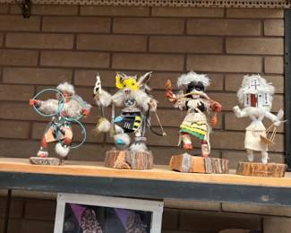 Native American Kachina Dolls
A set of four beautifully handcrafted Kachina dolls, each uniquely detailed with traditional Native American designs and vibrant colors. Perfect for collectors or Southwestern decor enthusiasts.