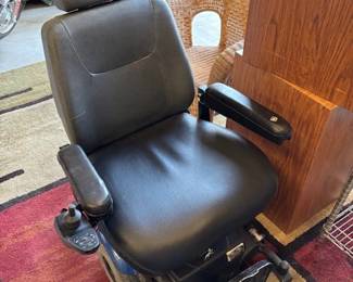 Electric Wheelchair
A high-quality electric wheelchair with a plush black seat and adjustable armrests. Includes easy-to-use controls for convenience and comfort.