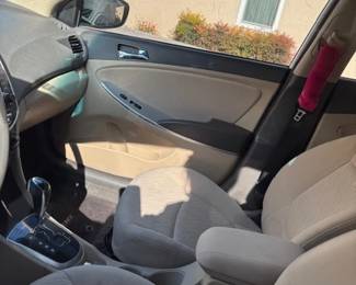 2014 Hyundai Accent - Interior
A clean and well-maintained interior featuring comfortable beige cloth seats, automatic transmission, and modern features. Perfect for daily commuting or road trips.