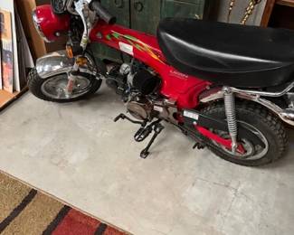 Red Honda Clone Mini Bike
A 2006 Honda Clone mini bike in excellent condition with a bright red finish. Perfect for enthusiasts or collectors of unique motorcycles.