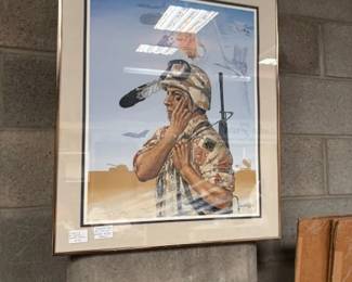 Framed Military Artwork
A framed piece of military-themed art depicting a soldier in a reflective pose. A meaningful addition to a patriotic or military memorabilia collection.