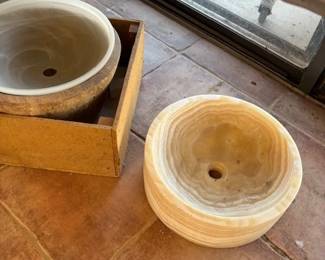 Onyx and Stone Sinks
A beautiful collection of carved stone and onyx sinks, perfect for adding a luxurious and natural touch to your bathroom or kitchen. Each piece features unique patterns and textures.