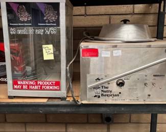 Nutty Bavarian Nut Roaster Machine
A commercial-grade Nutty Bavarian nut roaster, accompanied by a display case for serving cinnamon-glazed nuts. A fantastic opportunity for small business owners or food enthusiasts.