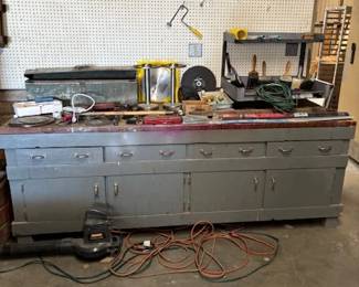 Metal Workshop Cabinet
A sturdy, large metal workshop cabinet with multiple drawers and compartments, perfect for organizing tools, hardware, and equipment. A functional and durable addition to any workspace.