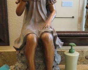 Little Girl with Butterfly Statue