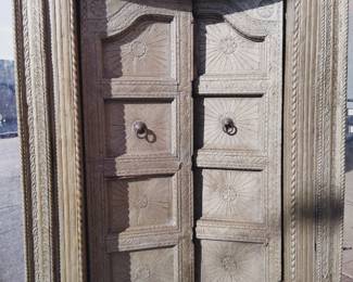 This is a door from the 17th century imported by Indian rich family came from Temple of course this door have amulet very powerful omelette The wood is discontinue there are no more tree like this anymore and this would cost 5 lb over $200 a pound it smell incense every square inch and if you burn it the whole block of town it will be a smell not only a house building 15 century and on 17th century they recover it in a Bronx 110 of an inch recover hand car engraved in the top of the boot as you can see on 19 60 the gentleman took it from Temple and brother to USA he passed away on 2008