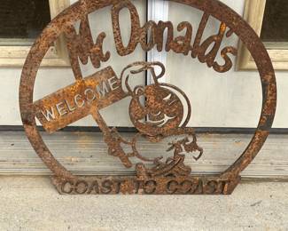 Vintage Cast Iron Mc Donald's Coast to Coast Signs featuring Speedee.