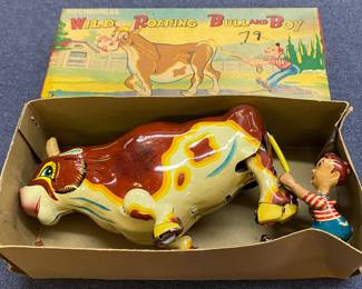 MIB Wild Roaring Bull and Boy Wind-up Tin Litho Toy 