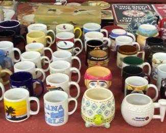 Lots of Sports and Assorted Mugs