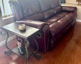Brown leather couch and side table