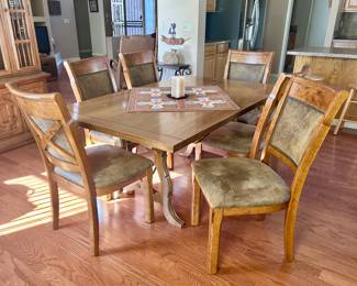 Smooth wood dining table with 6 chairs