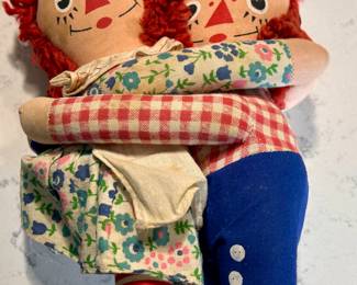 Hugging raggedy Ann vintage dolls