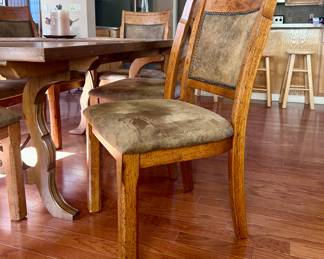Smooth wood dining table with 6 chairs