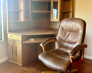 Rolling and swiveling office armchair